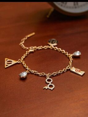 Gold Charm Link Bracelet with Crystal and Icon Pendants